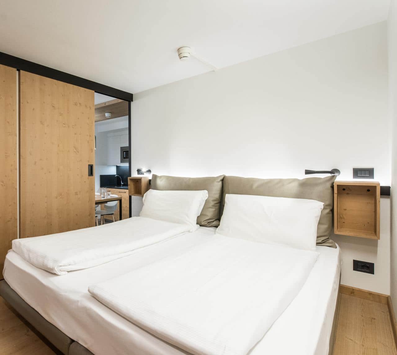 https://www.residencehotels.com/wp-content/uploads/2026/01/D_AMBIEZ_CAMPIGLIO_HOME_standard_alcova.jpg