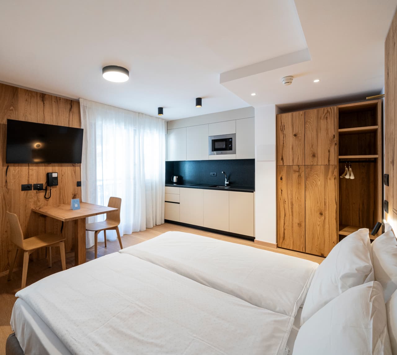https://www.residencehotels.com/wp-content/uploads/2026/02/D_CONTRIN_CANAZEI_HOME_TIPOLOGIA_1.png
